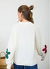 White Knit Sweater With Multi-colored Crochet Flowers
