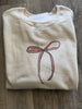 She Is Clothed With Graphic Bow Sweatshirt