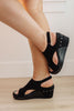 Corky’s Walk This Way Wedge Sandals in Black Suede